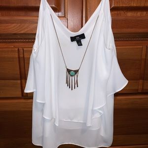 Medium white tank top with necklace embellishment